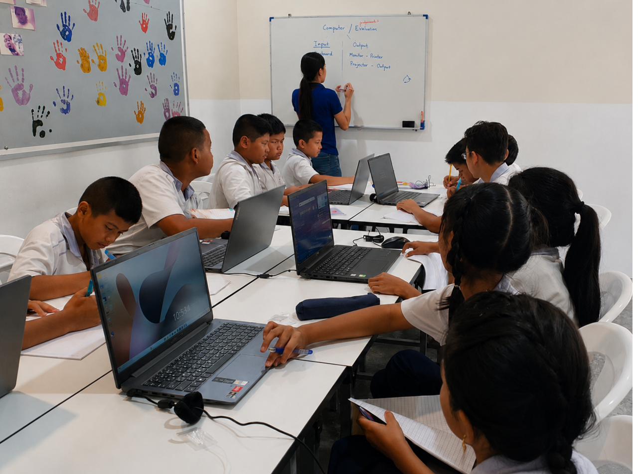 Students using laptops during a lesson